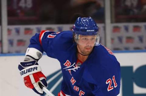 NEW YORK – SEPTEMBER 15: Chris Higgins #21 skates in his first game as a member of the New York Rangers against the Boston Bruins at Madison Square Garden on September 15, 2009, in New York, New York. (Photo by Bruce Bennett/Getty Images)