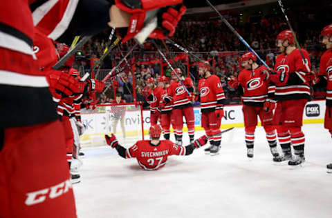 RALEIGH, NC – DECEMBER 31: Andrei Svechnikov #37 of the Carolina Hurricanes celebrates during the team’s storm surge after their victory over the Philadelphia Flyers following an NHL game on December 31, 2018 at PNC Arena in Raleigh, North Carolina. (Photo by Gregg Forwerck/NHLI via Getty Images)