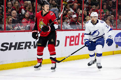 OTTAWA, ON – APRIL 01: Ottawa Senators Left Wing Brady Tkachuk (7) keeps eyes on the play shadowed by Tampa Bay Lightning Center Cedric Paquette (13) during second period National Hockey League action between the Tampa Bay Lightning and Ottawa Senators on April 1, 2019, at Canadian Tire Centre in Ottawa, ON, Canada. (Photo by Richard A. Whittaker/Icon Sportswire via Getty Images)