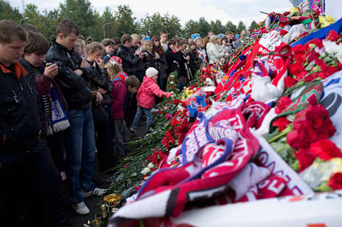 2011: YAROSLAVL, RUSSIA – Mourners place flowers and candles at the “Arena 2000” on September 8, 2011 in Yaroslavl, Russia where the Lokomotiv ice hockey team was killed in a plane crash. (Photo by Harry Engels/Getty Images)