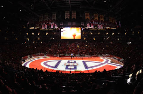 Jan 19, 2013; Montreal, QC, CAN; On ice projection of the Canadiens logo during the warmup period at the Bell Centre. Mandatory Credit: Eric Bolte-USA TODAY Sports