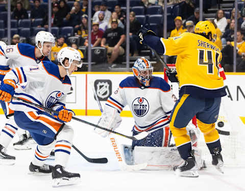 Oct 17, 2023; Nashville, Tennessee, USA; Kiefer Sherwood (44) of the Nashville Predators attempts to score as goalie Jack Campbell (36) of the Edmonton Oilers covers the goal during the third period of their game at Bridgestone Arena. Mandatory Credit: Alan Poizner-USA TODAY Sports