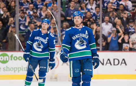 Henrik and Daniel Sedin (Photo by Rich Lam/Getty Images)