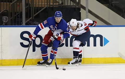 New York Rangers right wing Kaapo Kakko (24) skates against Washington Capitals left wing Carl Hagelin (62) dCredit: Al Bello/POOL PHOTOS-USA TODAY Sports