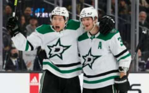 LAS VEGAS, NEVADA – DECEMBER 08: Jason Robertson #21 and John Klingberg #3 of the Dallas Stars celebrate after Klingberg assisted Robertson on a first-period power-play goal against the Vegas Golden Knights during their game at T-Mobile Arena on December 8, 2021 in Las Vegas, Nevada. (Photo by Ethan Miller/Getty Images)