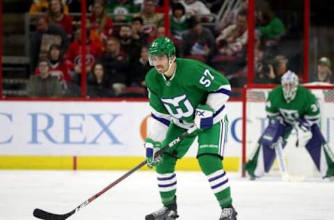 RALEIGH, NC – DECEMBER 23: Trevor van Riemsdyk #57 of the Carolina Hurricanes skates to a defensive position during an NHL game against the Boston Bruins on December 23, 2018 at PNC Arena in Raleigh, North Carolina. (Photo by Gregg Forwerck/NHLI via Getty Images)