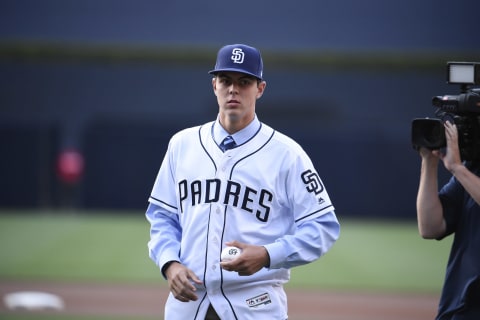 SAN DIEGO, CA – JUNE 24: San Diego Padres draft pick MacKenzie Gorre throws out the first pitch before a baseball game between the Padres and the Detroit Tigers at PETCO Park on June 24, 2017 in San Diego, California. (Photo by Denis Poroy/Getty Images)