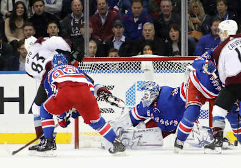 NEW YORK, NEW YORK – OCTOBER 16: Henrik Lundqvist #30 of the New York Rangers makes the pad save late in the second period on Matt Nieto #83 of the Colorado Avalanche at Madison Square Garden on October 16, 2018 in New York City. (Photo by Bruce Bennett/Getty Images)