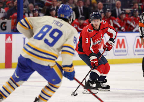 Mar 25, 2022; Buffalo, New York, USA; Buffalo Sabres right wing Alex Tuch (89) watches as Washington Capitals defenseman Nick Jensen (3) looks to make a pass during the third period at KeyBank Center. Mandatory Credit: Timothy T. Ludwig-USA TODAY Sports