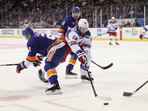 NEW YORK, NEW YORK – NOVEMBER 15: Mika Zibanejad #93 of the New York Rangers skates against the New York Islanders at the Barclays Center on November 15, 2018 in the Brooklyn borough of New York City. The Islanders defeated the Rangers 7-5. (Photo by Bruce Bennett/Getty Images)