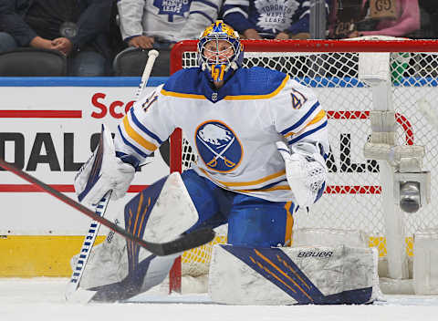 TORONTO, ON – APRIL 12: Craig Anderson #41 of the Buffalo Sabres keeps an eye on a high puck against the Toronto Maple Leafs during an NHL game at Scotiabank Arena on April 12, 2022 in Toronto, Ontario, Canada. The Sabres defeated the Maple Leafs 5-2. (Photo by Claus Andersen/Getty Images)