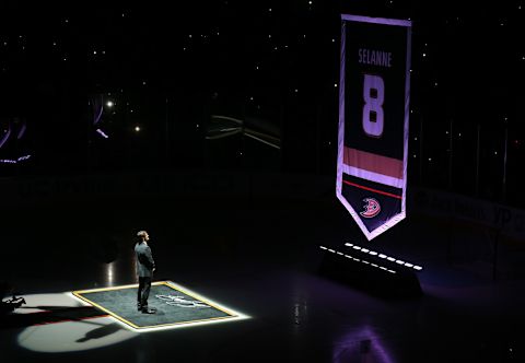 ANAHEIM, CA – JANUARY 11: Former Anaheim Ducks star Teemu Selanne stands on the ice as his banner is raised during ceremonies retiring Selanne’s number by the Ducks before the game with the Winnipeg Jets at Honda Center on January 11, 2015 in Anaheim, California. (Photo by Stephen Dunn/Getty Images)