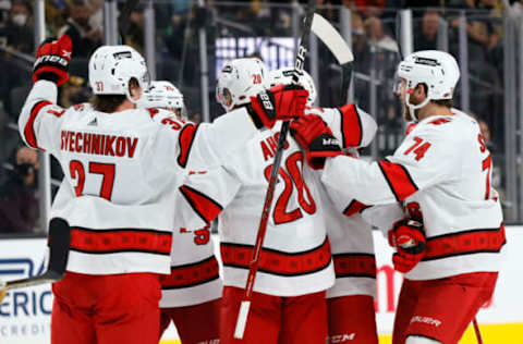 LAS VEGAS, NEVADA – NOVEMBER 16: The Carolina Hurricanes celebrate a third-period goal by Seth Jarvis #24 against the Vegas Golden Knights during their game at T-Mobile Arena on November 16, 2021, in Las Vegas, Nevada. The Hurricanes defeated the Golden Knights 4-2. (Photo by Ethan Miller/Getty Images)