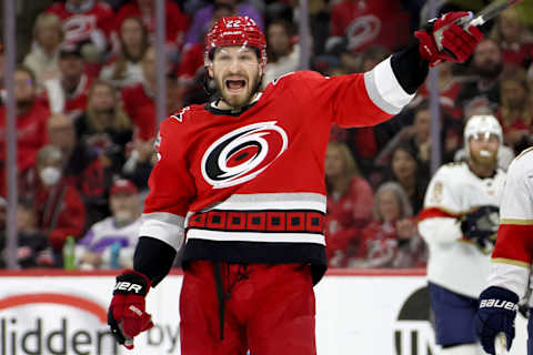 RALEIGH, NORTH CAROLINA – MAY 18: Brett Pesce #22 of the Carolina Hurricanes argues for penalty against the Florida Panthers during the first period in Game One of the Eastern Conference Final of the 2023 Stanley Cup Playoffs at PNC Arena on May 18, 2023 in Raleigh, North Carolina. (Photo by Bruce Bennett/Getty Images)