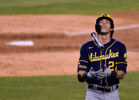 LOS ANGELES, CALIFORNIA – OCTOBER 01: Christian Yelich of the Milwaukee Brewers reacts to his strikeout. (Photo by Harry How/Getty Images)