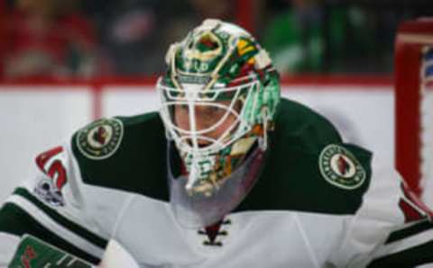 Mar 16, 2017; Raleigh, NC, USA; Minnesota Wild goalie Devan Dubnyk (40) watches the play against the Carolina Hurricanes at PNC Arena. The Carolina Hurricanes defeated the Minnesota Wild 3-1. Mandatory Credit: James Guillory-USA TODAY Sports