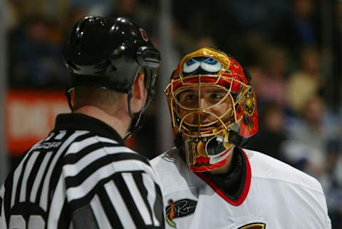 TORONTO – APRIL 10: Goaltender Patrick Lalime #40 of the Ottawa Senators talks to an on-ice NHL Official during a break in game two of the Eastern Conference Quarterfinals of the 2004 Stanley Cup Playoffs against the Toronto Maple Leafs at Air Canada Centre on April 10, 2004 in Toronto, Ontario, Canada. The Maple Leafs defeated the Senators 2-0 to tie the series at 1-1. (Photo By Dave Sandford/Getty Images)