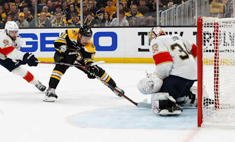 Dmitry Orlov #81 of the Boston Bruins shoots the puck . (Photo by Rich Gagnon/Getty Images)