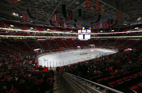 Dec 19, 2016; Raleigh, NC, USA; Carolina Hurricanes and Detroit Red Wings fans wait for the game to start because of a delay to mechanical problems with the ice at PNC Arena. Mandatory Credit: James Guillory-USA TODAY Sports