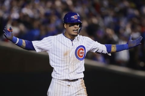 CHICAGO, IL – OCTOBER 02: Javvier Baez #9 of the Chicago Cubs celebrates after hitting a RBI double in the eighth inning against the Colorado Rockies to score Terrrance Gore #1 (not pictured) during the National League Wild Card Game at Wrigley Field on October 2, 2018 in Chicago, Illinois. (Photo by Jonathan Daniel/Getty Images)