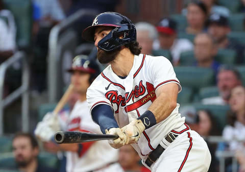 ATLANTA, GEORGIA – AUGUST 18: Dansby Swanson #7 of the Atlanta Braves hits a RBI double in the third inning to score Robbie Grossman #15 against the New York Mets at Truist Park on August 18, 2022 in Atlanta, Georgia. (Photo by Kevin C. Cox/Getty Images)