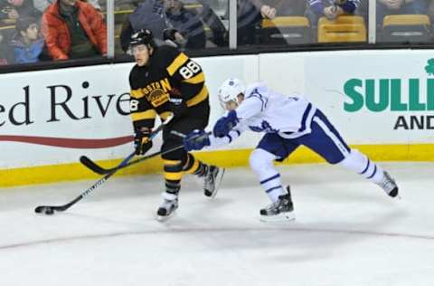 BOSTON, MA – DECEMBER 10: Boston Bruins Right Wing David Pastrnak (88) passes the puck up ice to an open teammate. During the Boston Bruins game against the Toronto Maple Leafs on December 10, 2016 at TD Bank Garden in Boston, MA. (Photo by Michael Tureski/Icon Sportswire via Getty Images)