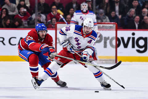 MONTREAL, QC – FEBRUARY 22: Mats Zuccarello #36 of the New York Rangers skates the puck against Phillip Danault #24 of the Montreal Canadiens during the NHL game at the Bell Centre on February 22, 2018 in Montreal, Quebec, Canada. (Photo by Minas Panagiotakis/Getty Images)