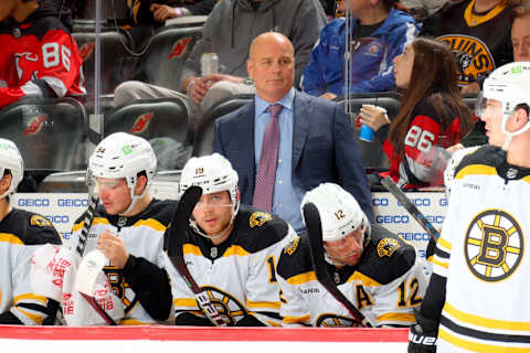 NEWARK, NJ – OCTOBER 03: Boston Bruins head coach Jim Montgomery behind the bench during the game against the New Jersey Devils on October 3, 2022 at the Prudential Center in Newark, New Jersey. (Photo by Rich Graessle/Getty Images)