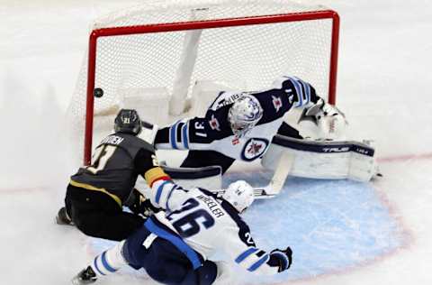 Connor Hellebuyck #37, Blake Wheeler #26, Winnipeg Jets. (Photo by Ethan Miller/Getty Images)