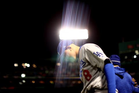 BOSTON, MA – OCTOBER 24: Manny Machado #8 of the Los Angeles Dodgers warms up prior to Game 2 of the 2018 World Series against the Boston Red Sox at Fenway Park on Wednesday, October 24, 2018 in Boston, Massachusetts. (Photo by Adam Glanzman/MLB Photos via Getty Images)