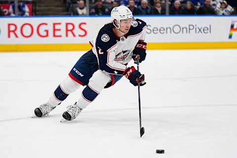 Apr 4, 2023; Toronto, Ontario, CAN; Columbus Blue Jackets defenseman Andrew Peeke (2) carries the puck against the Toronto Maple Leafs at Scotiabank Arena. Mandatory Credit: John E. Sokolowski-USA TODAY Sports