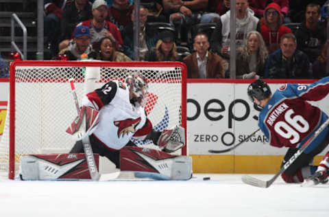 DENVER, COLORADO – OCTOBER 12: Goaltender Antti Raanta #32 of the Arizona Coyotes makes a save against Mikko Rantanen #96 of the Colorado Avalanche at the Pepsi Center on October 12, 2019 in Denver, Colorado.