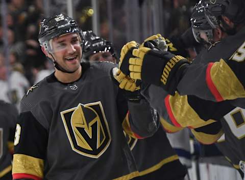 LAS VEGAS, NEVADA – FEBRUARY 20: Alec Martinez #23 of the Vegas Golden Knights celebrates with teammates on the bench after scoring a first-period goal against the Tampa Bay Lightning during their game at T-Mobile Arena on February 20, 2020 in Las Vegas, Nevada. (Photo by Ethan Miller/Getty Images)