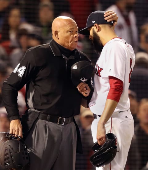 BOSTON – OCTOBER 24: Boston Red Sox starting pitcher David Prrice speaks with home plate umpire Kerwwin Danley at the end of the top of the fourth inning. The Boston Red Sox host the Los Angeles Dodgers in Game Two of the World Series at Fenway Park in Boston on Oct. 24, 2018. (Photo by Jim Davis/The Boston Globe via Getty Images)