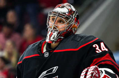 RALEIGH, NC – APRIL 15: Carolina Hurricanes goaltender Petr Mrazek (34) sits in net in a time out during a game between the Carolina Hurricanes and the Washington Capitals on April 15, 2019, at the PNC Arena in Raleigh, NC. (Photo by Greg Thompson/Icon Sportswire via Getty Images)