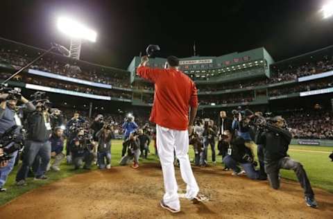 Oct 10, 2016; Boston, MA, USA; Boston Red Sox designated hitter David Ortiz (34) salutes the fans after losing to the Cleveland Indians 3-4 in game three of the 2016 ALDS playoff baseball series at Fenway Park. Mandatory Credit: Greg M. Cooper-USA TODAY Sports