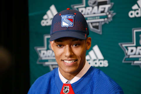 K’Andre Miller after being selected twenty-second overall by the New York Rangers(Photo by Ron Jenkins/Getty Images)