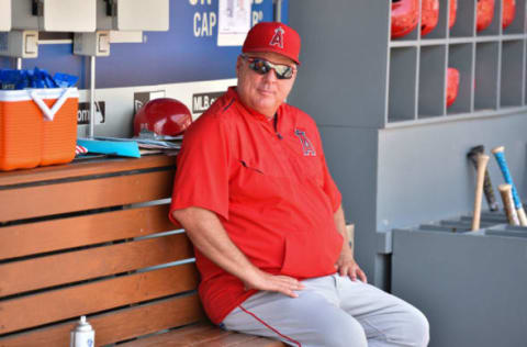 LOS ANGELES, CA – JULY 15: Los Angeles Angels manager Mike Scioscia looks on in the dugout during a MLB game between the Los Angeles Angels of Anaheim and the Los Angeles Dodgers on July 15, 2018 at Dodger Stadium in Los Angeles, CA. (Photo by Brian Rothmuller/Icon Sportswire via Getty Images)