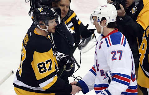 Apr 23, 2016; Pittsburgh, PA, USA; Pittsburgh Penguins center Sidney Crosby (87) and New York Rangers defenseman Ryan McDonagh (27) shake hands after the Penguins defeated the Rangers 6-3 in game five of the first round of the 2016 Stanley Cup Playoffs at the CONSOL Energy Center. Mandatory Credit: Charles LeClaire-USA TODAY Sports