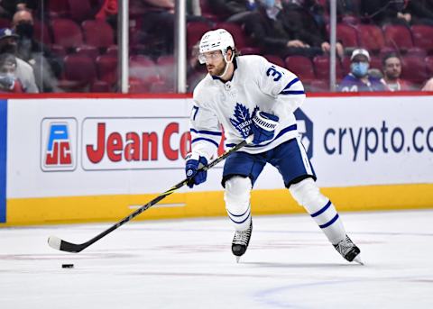 MONTREAL, QC – FEBRUARY 21: Timothy Liljegren #37 of the Toronto Maple Leafs skates the puck against the Montreal Canadiens during the third period at Centre Bell on February 21, 2022 in Montreal, Canada. The Montreal Canadiens defeated the Toronto Maple Leafs 5-2. (Photo by Minas Panagiotakis/Getty Images)