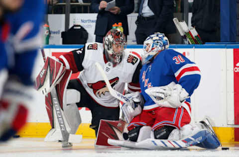 NEW YORK, NY – OCTOBER 22: Henrik Lundqvist #30 of the New York Rangers talks to former teammate Antti Raanta #32 of the Arizona Coyotes prior to the game at Madison Square Garden on October 22, 2019 in New York City. (Photo by Jared Silber/NHLI via Getty Images)