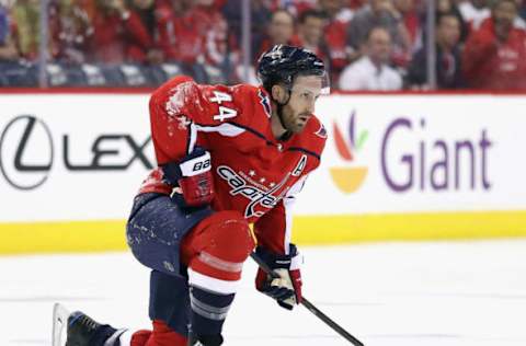 WASHINGTON, DC – APRIL 24: Brooks Orpik #44 of the Washington Capitals pauses after a second period hit by Jordan Martinook #48 of the Carolina Hurricanes in Game Seven of the Eastern Conference First Round during the 2019 NHL Stanley Cup Playoffs at the Capital One Arena on April 24, 2019 in Washington, DC. (Photo by Patrick Smith/Getty Images)