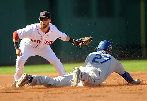 BOSTON – JUNE 19: Dustin Peddroia #15 of the Boston Red Sox tags out Matt Kemmp #27 of the Los Angeles Dodgers as he attempts to steal second base during the third inning on June 19, 2010 at Fenway Park in Boston, Massachusetts. (Photo by Michaael Ivins/Boston Red Sox/Getty Images)`