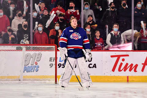 LAVAL, QC – APRIL 08: Goaltender Ukko-Pekka Luukkonen #1 of the Rochester Americans stands during the anthems prior to the game against the Laval Rocket at Place Bell on April 8, 2022 in Laval, Canada. The Laval Rocket defeated the Rochester Americans 4-3 in overtime. (Photo by Minas Panagiotakis/Getty Images)