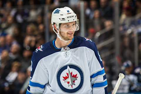 TORONTO, ON – OCTOBER 27: Jacob Trouba #8 of the Winnipeg Jets looks on against the Toronto Maple Leafs during the first period at the Scotiabank Arena on October 27, 2018, in Toronto, Ontario, Canada. (Photo by Kevin Sousa/NHLI via Getty Images)