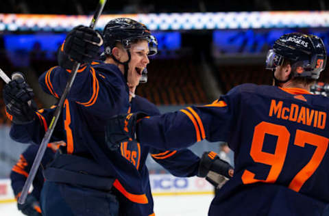 Jesse Puljujarvi #13, Connor McDavid #97, Edmonton Oilers (Photo by Codie McLachlan/Getty Images)