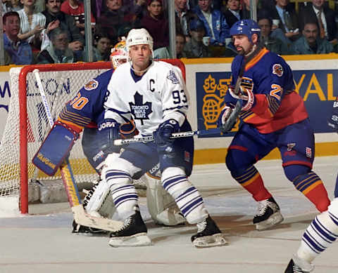 TORONTO, ON – APRIL 16: Doug Gilmour #93 of the Toronto Maple Leafs skates against Jon Casey #30   (Photo by Graig Abel/Getty Images)