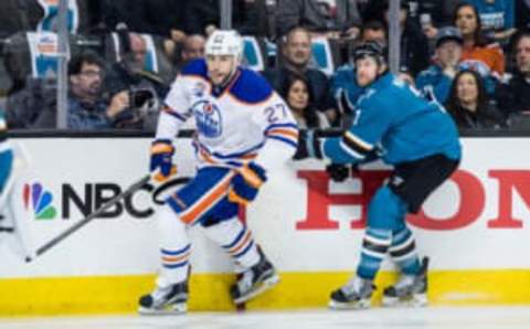 Edmonton Oilers left wing Milan Lucic (27) skates ahead of San Jose Sharks defenseman Paul Martin (7) in the 2017 Stanley Cup Playoffs (Kelley L Cox-USA TODAY Sports)