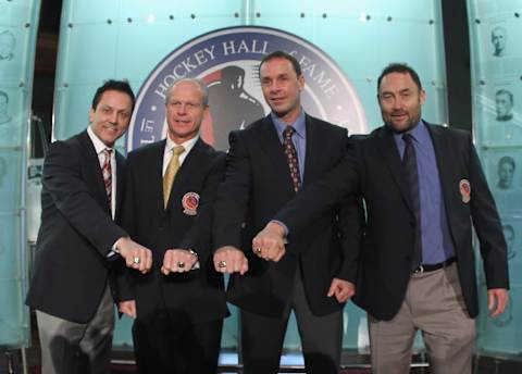 TORONTO, ON – NOVEMBER 14: (L-R) 2011 Hall of Fame inductees Doug Gilmour, Mark Howe, Joe Nieuwendyk and Ed Belfour   (Photo by Bruce Bennett/Getty Images)