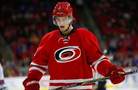 Jan 22, 2016; Raleigh, NC, USA; Carolina Hurricanes defensemen Noah Hanifin (5) looks on against the New York Rangers at PNC Arena. The New York Rangers defeated the Carolina Hurricanes 4-1. Mandatory Credit: James Guillory-USA TODAY Sports